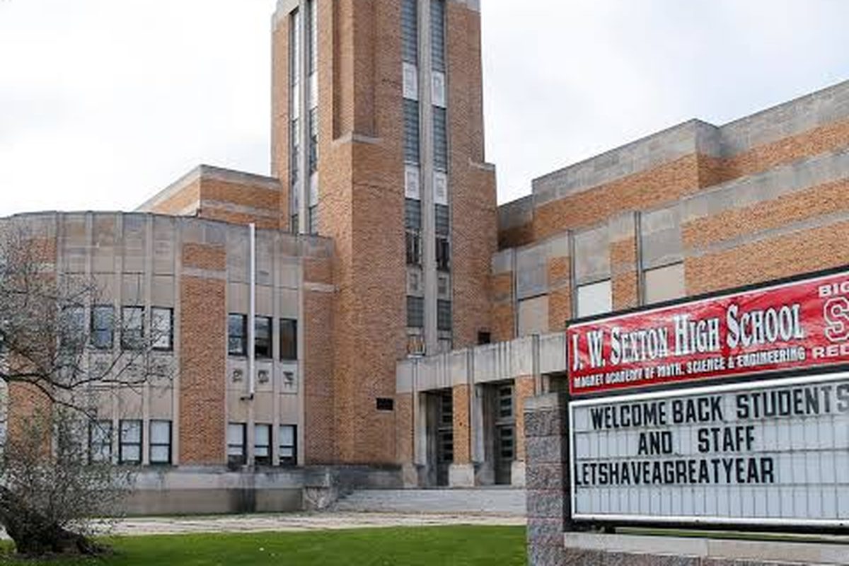 J.W. Sexton High School front entrance with the school sign reading Welcome Back Students and Staff